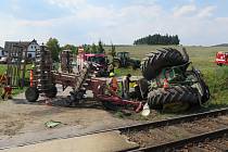 Nehoda vlaku s traktorem u Smrkovic.