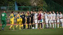 Fotbalisté Neratovic (ve žlutém) porazili v domácím utkání 24. kola divize B Slaný 2:0.