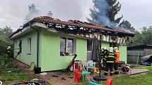 Požár rodinného domu v Měšicích.