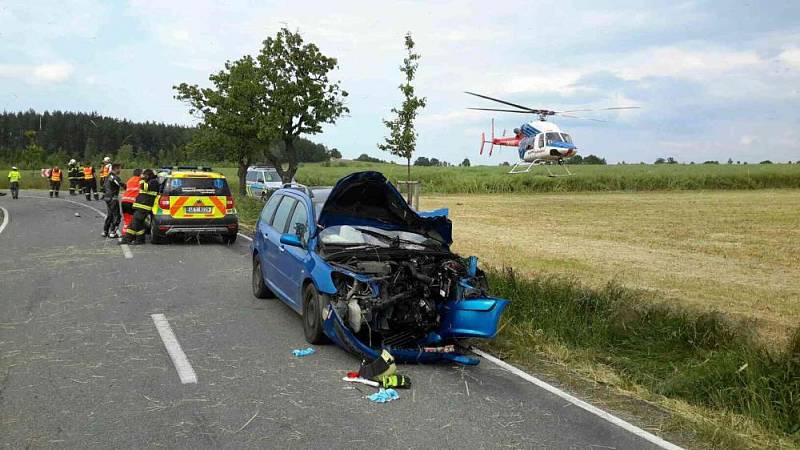 Srážka osobního automobilu a motocyklu u Předhradí