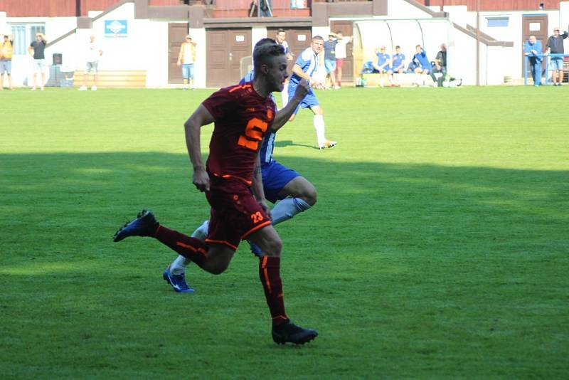 Z fotbalového utkání I.A třídy Slovan Poděbrady - Pšovka Mělník (4:1)