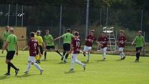 Z fotbalového utkání okresního přeboru Kostomlaty - Bohemia Poděbrady B (1:0)
