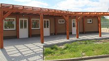 Nové zázemí pro sportovní areál u rybníka v Křelově. Místní tam budou mít k dispozici kuchyňku, šatny, sprchy a sociální zařízení.