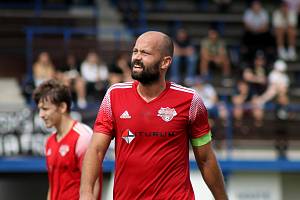 Fotbalisté plzeňského Petřína (na archivním snímku hráči v červených dresech) remizovali doma s Aritmou Praha 1:1.