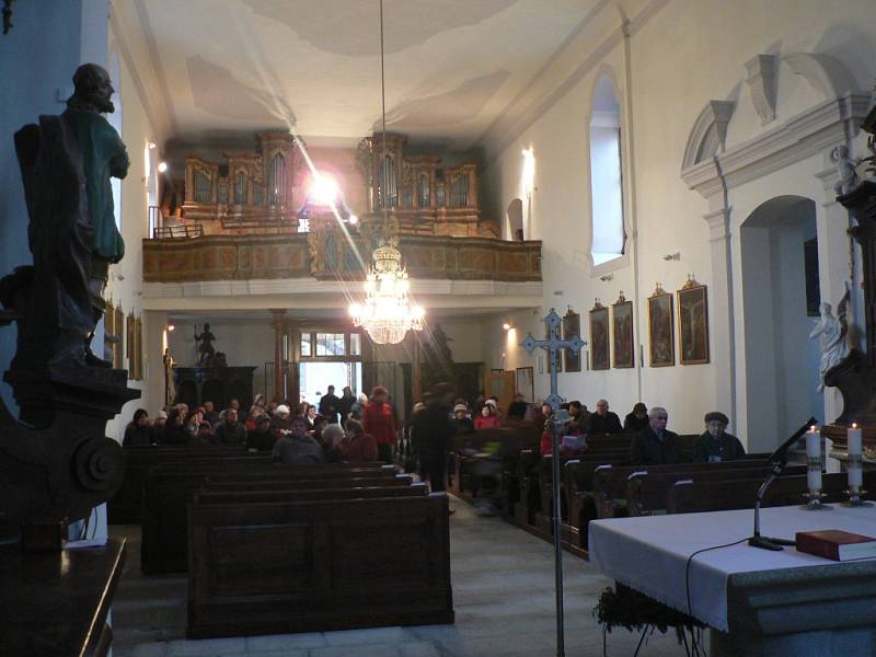 Křtiny v kostele v Týně nad Vltavou.