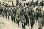 March of the Kurimské Sokols of the municipality before the Second World War.  Oldřich Odehnal is in the lead.