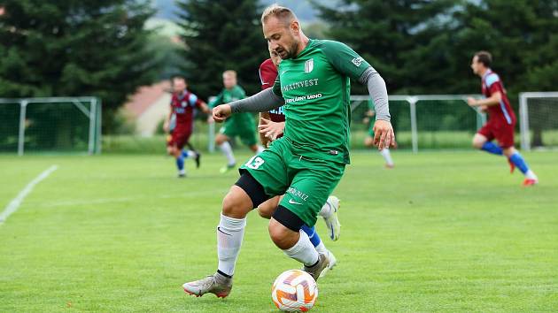 Bystrčtí fotbalisté (v zeleném) v dohrávce 22. kola doma remizovali s Moravskou Slavií 0:0