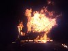 Noční požár chaty v Brně: Oheň budovu zcela zničil, majitel se nadýchal kouře