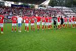 Soccer players of Zbrojovka Brno (in red) celebrate with their fans. 