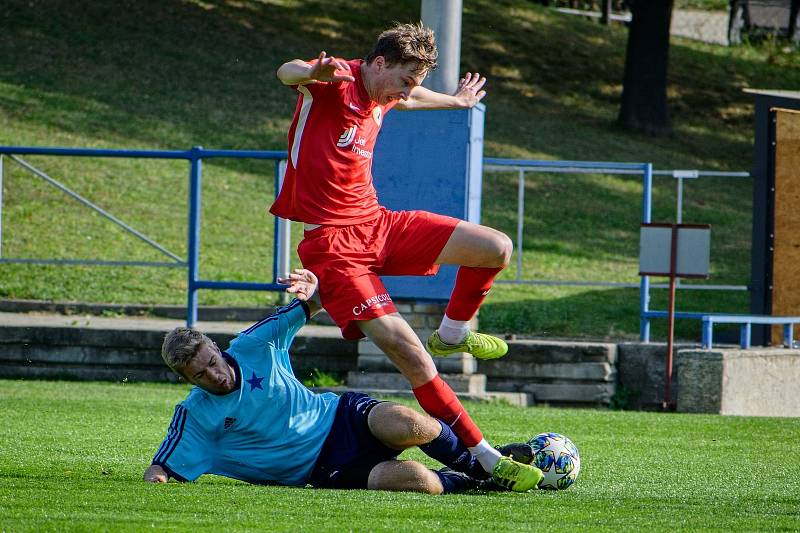 Bohuničtí fotbalisté (v červeném) přehráli v brněnském derby Moravskou Slavii jasně 4:0.