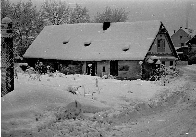 Zasněžený mlýn.