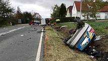 Nehoda policejního vozu s traktorem u Holostřev