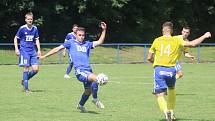 Divizní fotbalisté Slavičína (v modrém) začali nový ročník skupiny E parádně, v neděli dopoledne doma porazili rozdílem třídy Šumperk 4:1.