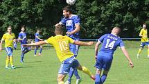 Divizní fotbalisté Slavičína (v modrém) začali nový ročník skupiny E parádně, v neděli dopoledne doma porazili rozdílem třídy Šumperk 4:1.