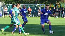 Fotbalisté Slavičína (v modrém) ve 2. kole MOL Cupu ve středu odpoledne před svými fanoušky podlehli prvoligové Karviné 1:5. Foto: Deník/Jan Zahnaš