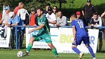 Fotbalisté Slavičína (v modrém) ve 2. kole MOL Cupu ve středu odpoledne před svými fanoušky podlehli prvoligové Karviné 1:5. Foto: Deník/Jan Zahnaš