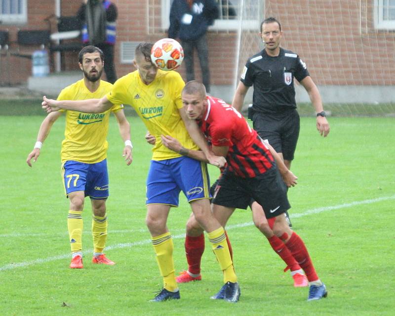 Fotbalisté Fastavu Zlín (ve žlutém) v úvodním kole Fortunba:ligy skupiny o záchranu hostili Slerzský FC Opava.