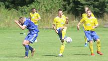 Divizní fotbalisté Slavičína (v modrém) začali nový ročník skupiny E parádně, v neděli dopoledne doma porazili rozdílem třídy Šumperk 4:1.