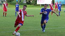 Dvizní fotbalisté Slavičína (v modrém) v rámci středečního 1. kola MOL Cupu doma vyřadili třetiligový Frýdek-Místek v prodloužení 3:2. Foto: pro Deník/Jan Zahnaš