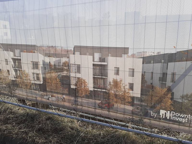 Výstavba bytové domy Riverfront Gardens na Tyršově nábřeží.