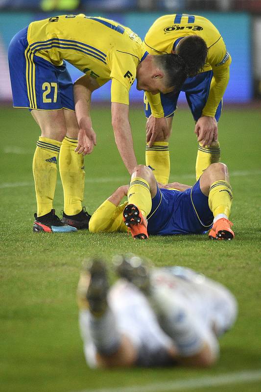 Utkání 23. kola první fotbalové ligy: Baník Ostrava - Fastav Zlín, 1. března 2019 v Ostravě. Na snímku Bačo Ondřej, Holík Libor a Džafič Adnan, v popředí Artem Meshchaninov.