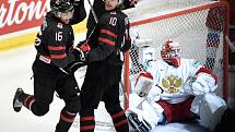 Mistrovství světa hokejistů do 20 let, finále: Rusko - Kanada, 5. ledna 2020 v Ostravě. Na snímku (zleva) Akil Thomas, Rapheal Lavoie a brankář Ruska Amir Miftakhov.