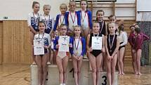 Šumperské gymnastky na přeboru Olomouckého kraje. V. liga - Evjáková, Peduzzi, Jurásková, T. Paraska, Petrová.