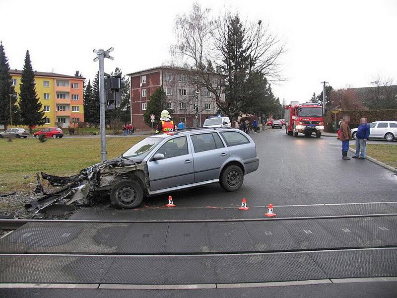 Nehoda na železničním přejezdu v Postřelmově 12. ledna 2011