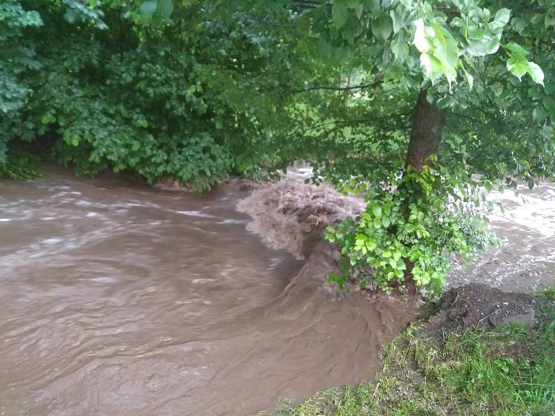 Následky průtrže mračen ve čtvrtek 13. června v Petrově nad Desnou.