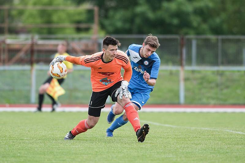 Fotbalisté Přerova (v modrém) v přátelském utkání s 1. HFK Olomouc