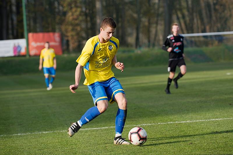 Fotbalisté Kozlovice (ve žlutém) doma porazili 1. HFK Olomouc 4:0.