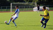 Úvodní kolo divize E nabídlo derby v Přerově mezi domácí Viktorkou (v bílém) a Kozlovicemi.