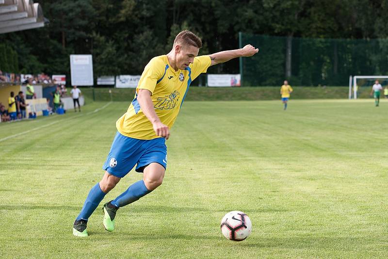 Fotbalisté Kozlovic (ve žlutém) doma porazili Bzenec 2:0. Jakub Kašík