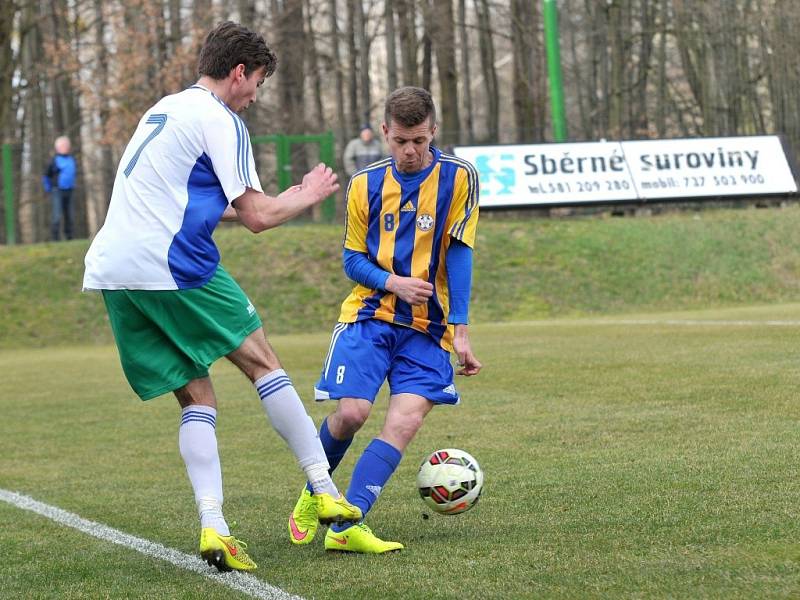 Kozlovice (ve žlutomodrém) proti Rýmařovu