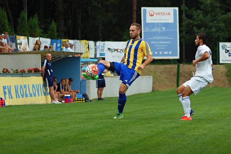 Fotbalisté Kozlovic (v pruhovaném) proti SK Hranice (2:1)