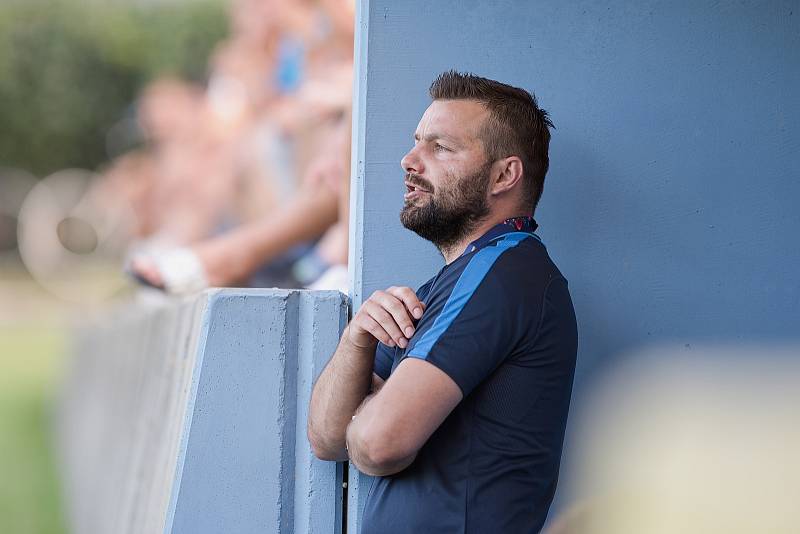 Fotbalisté Kozlovic (ve žlutém) doma porazili Bzenec 2:0. Michal Šrom