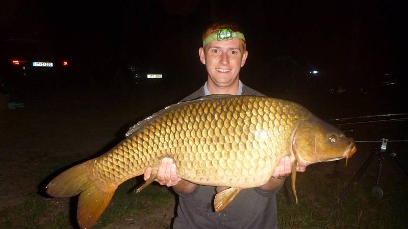 Soutěžní číslo 124 - David Arnošt, kapr, 88 cm a 12,9 kg.