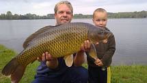 Soutěžní číslo 82 - Radim Sikora, kapr, 91 cm, 16 kg.