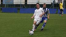 Fotbalisté Kunovic (bílé dresy) ve 21. kola krajské I. A třídy skupiny B podlehli Nedachlebicím 3:5.