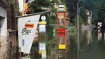 Povodně z roku 2002 v Praze. Už 9. srpna byly zaplaveny ulice šesté městské části.