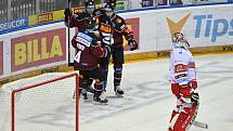 Dohrávka 8. kola hokejové extraligy: HC Sparta Praha - Mountfield Hradec Králové, 5. ledna 2021 v Praze. Hráči Sparty se radují z gólu, zleva David Vitouch, Lukáš Rousek a Matúš Sukeľ. Vpravo brankář Hradce Králové Štěpán Lukeš.