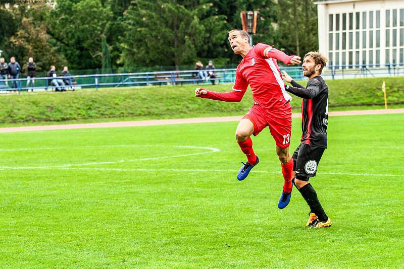 Blanenští fotbalisté (v červeném) v neděli podlehli Viktorii Žižkov 1:2.