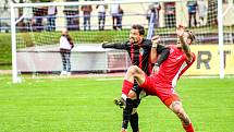 Blanenští fotbalisté (v červeném) v neděli podlehli Viktorii Žižkov 1:2. Foto: FK Blansko