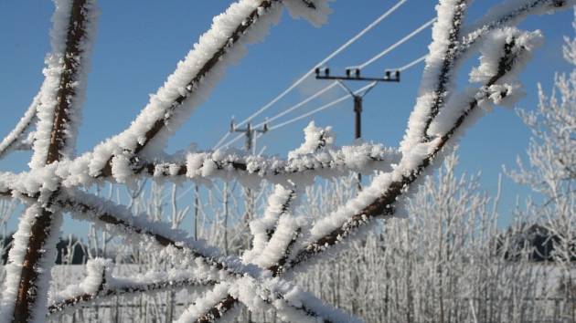Zasněžená a namrzlá zimní krajina na Blanensku