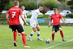 Fotbalisté Boskovic (v červeném) si na podzim doma smlsli i na líšeňském lídrovi, kterého porazili 4:0, a přezimují na druhé příčce.