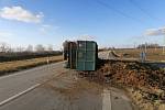 The dumped manure blocked the intersection.  The driver did not prefer the tractor and drove off.  The police are looking for him.