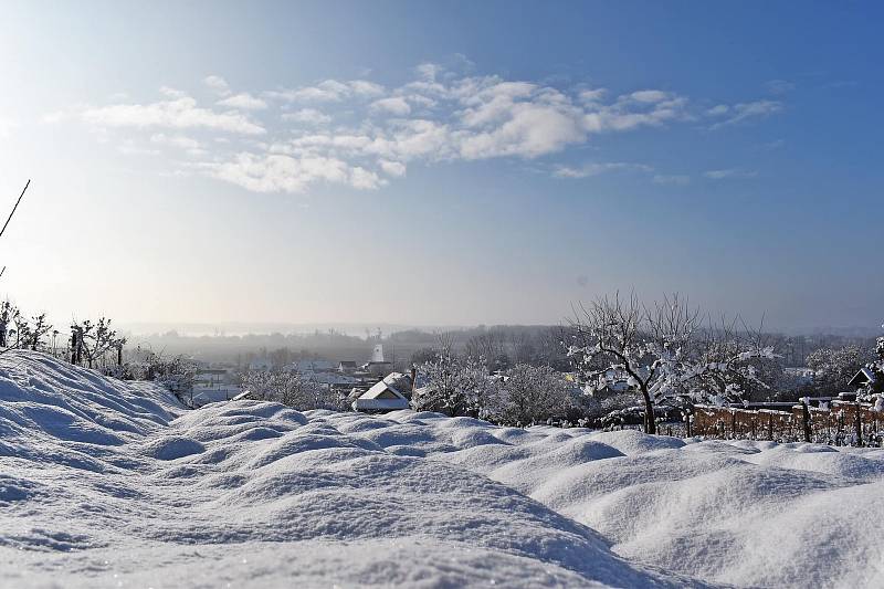 Procházka sněhovou nadílkou v Přítlukách