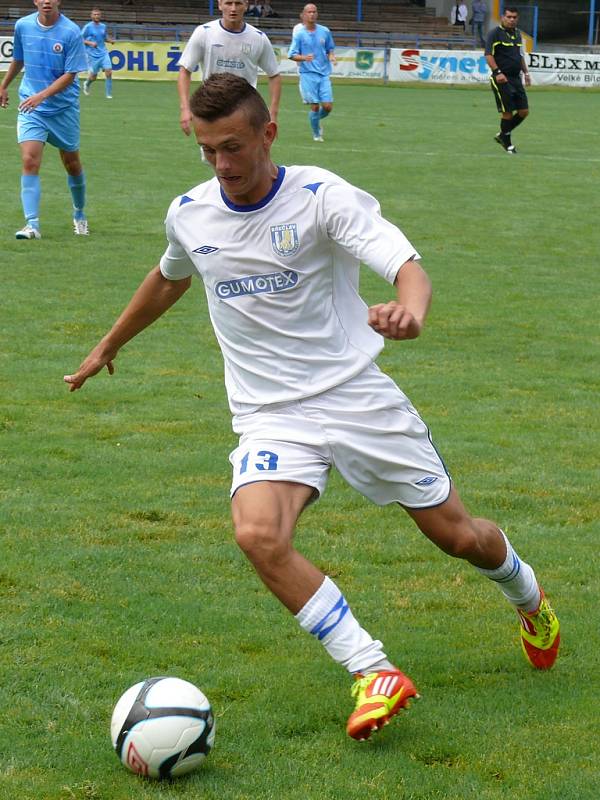 Břeclavští fotbalisté v utkání se Slovanem Bratislava.