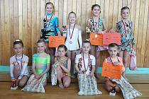 V Brně se malým břeclavským gymnastkám v základním programu dařilo. Celkem si pověsily na krk sedm medailí. 
