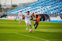 Vyškovští fotbalisté (v oranžovém) v úterý remizovali s rezervou Realu Madrid 1:1.